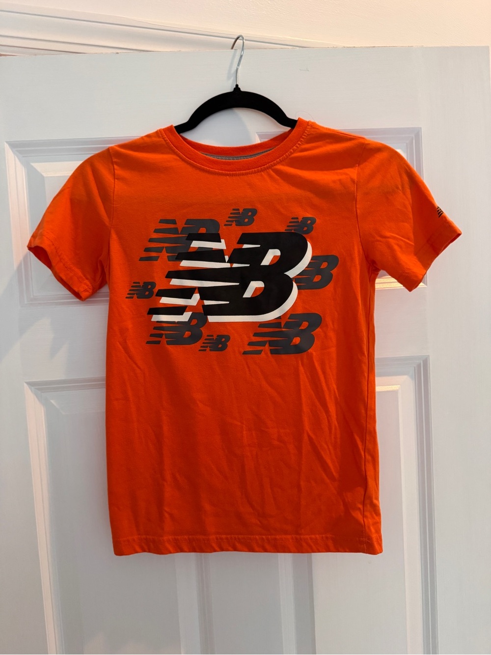 New Balance Kids Orange Tee with Black Logo